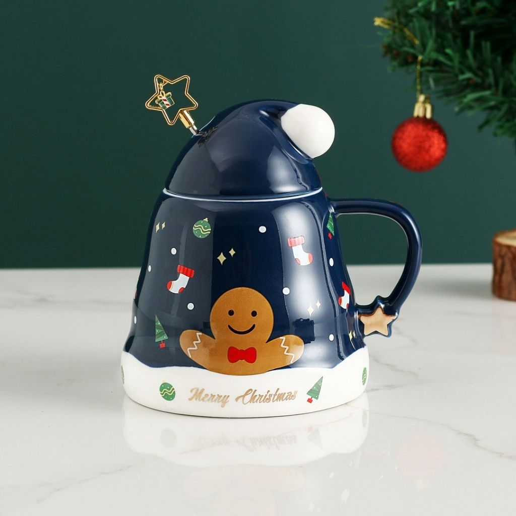 Close view of holiday themed ceramic mug showing detailed festive artwork and smooth glaze