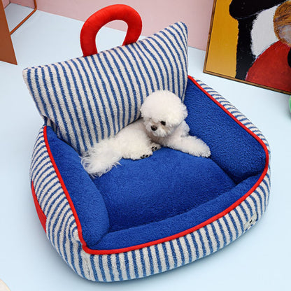 Soft pet sofa nest with supportive edges for small to medium dogs
