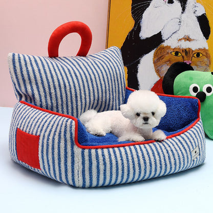 Orthopedic dog bed with bolster edges for anxiety relief and support