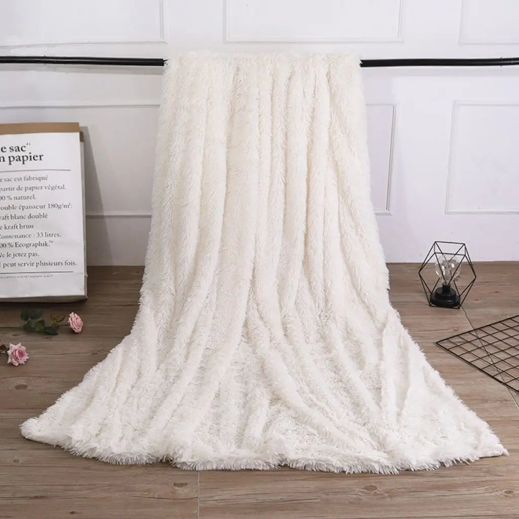 Beige polyester blanket used as backdrop for newborn photography sessions