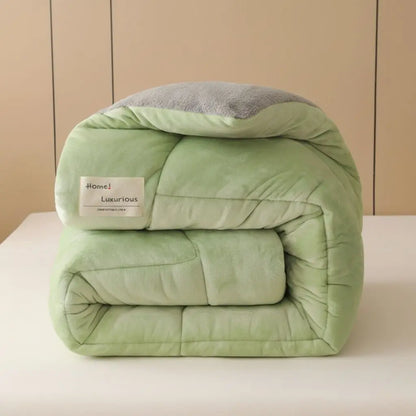 Quilted velvet comforter showing detailed stitching pattern and soft texture