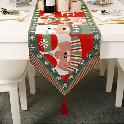 Festive table runner with holiday motifs and tassel trim full length view