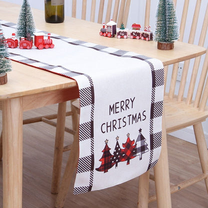 Festive Christmas table runner featuring snowflake and holiday pattern in red tones
