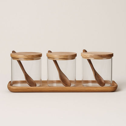  Glass spice jars with wooden lids for airtight kitchen storage and spice organization.