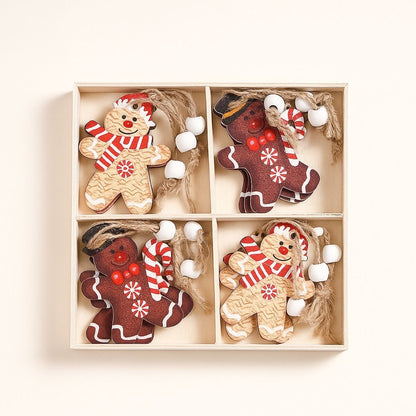 Wooden gingerbread ornaments with cartoon faces and festive details arranged on 