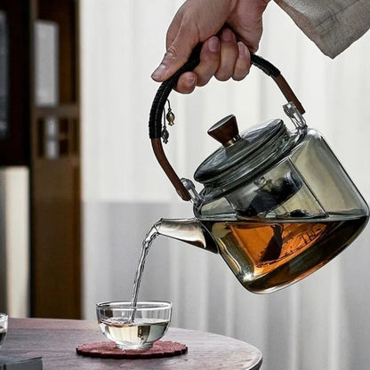 Glass teapot with removable strainer for brewing loose leaf tea