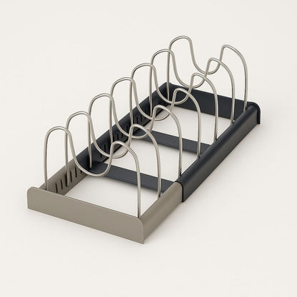 Stainless steel pot lid rack with adjustable design for efficient kitchen cabinet storage.