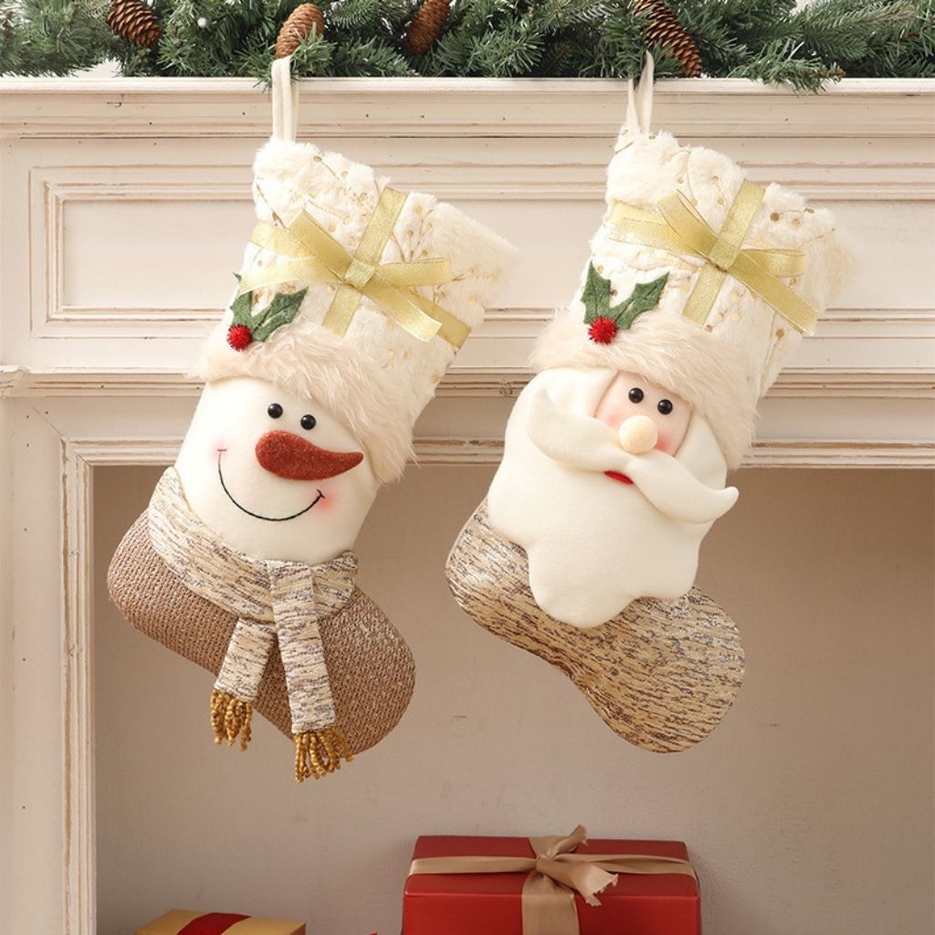 Red and white holiday stocking hanging display with textured fabric detail