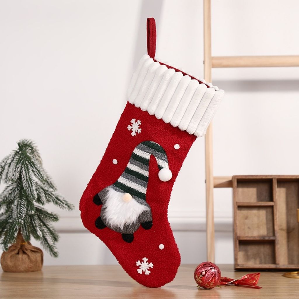 Soft cloth stocking with embroidered festive gnome and red cuff detail