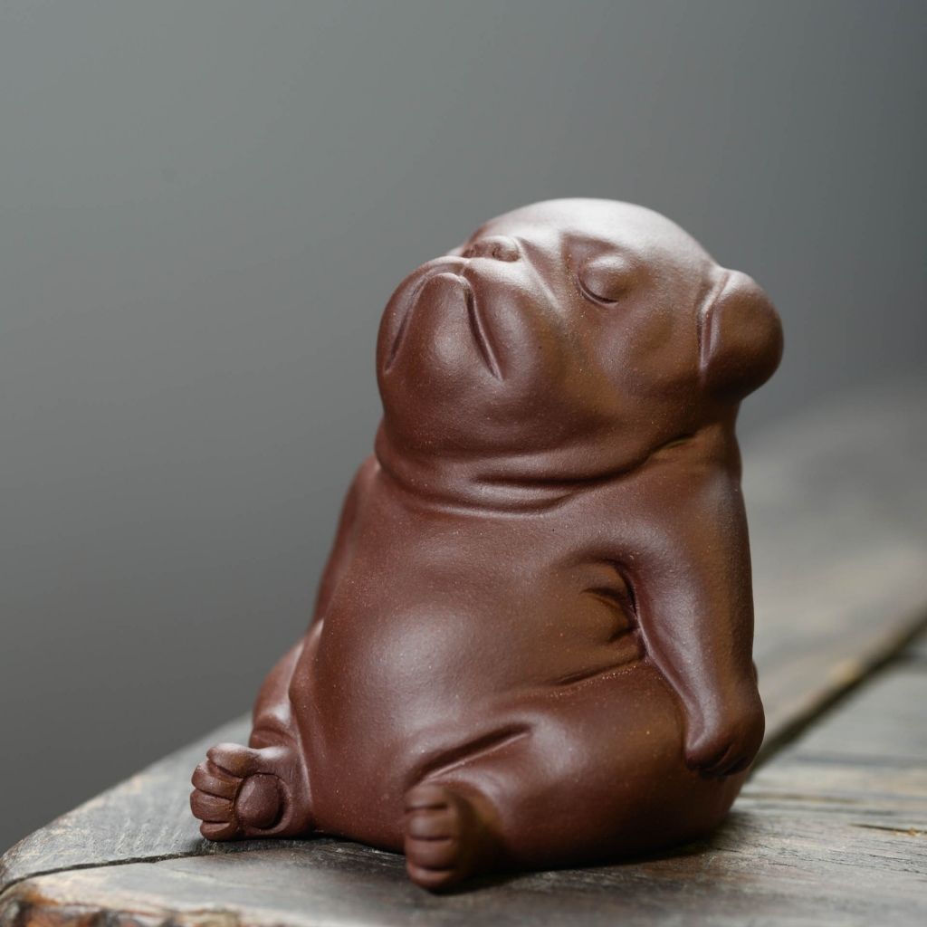 Cute handmade clay dog tea pet figurine ideal for tea rituals and as charming desk ornament