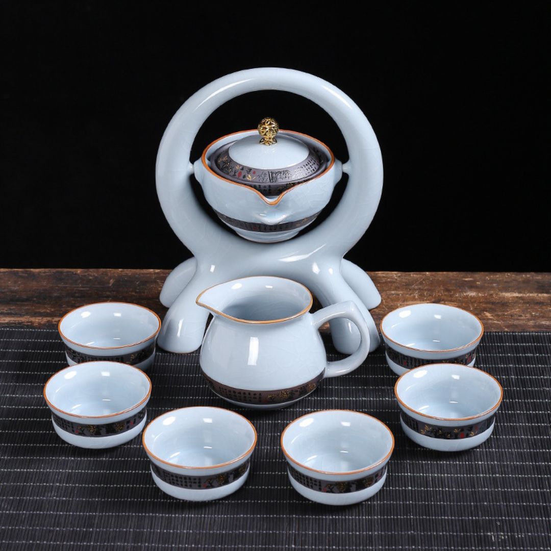  Gravity-fed ceramic tea set with rotating teapot and wide spout design