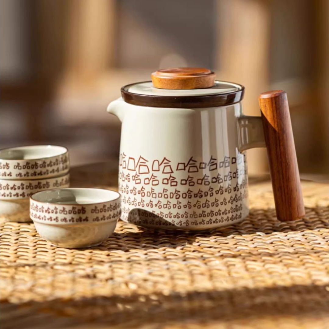  Ceramic tea cups with teapot arranged in travel-friendly configuration for tea enthusiasts