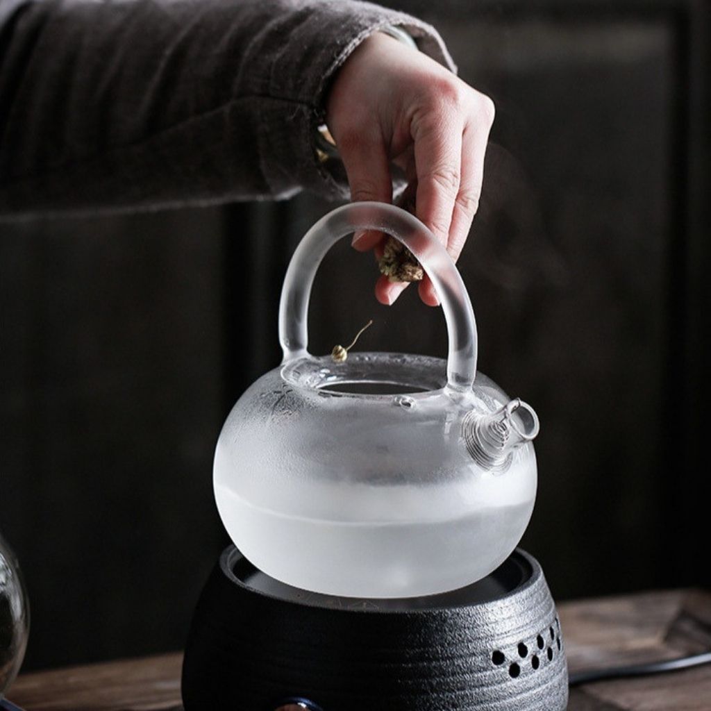 Compact glass teapot for office desk and workplace tea brewing