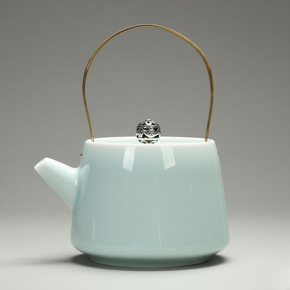 Celadon ceramic teapot with brass handle for loose leaf tea brewing