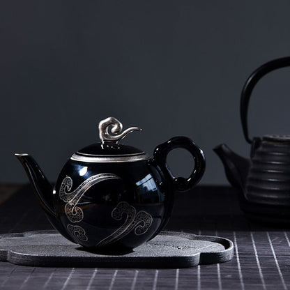 Small black ceramic teapot 8oz capacity with ergonomic handle for single serve brewing