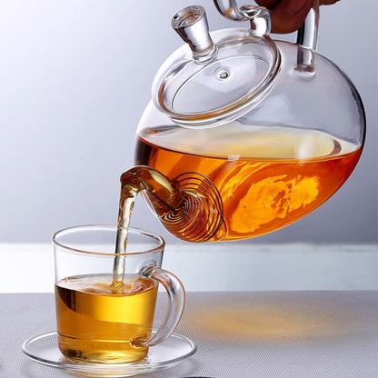 Glass teapot with removable infuser for blooming and loose leaf tea preparation