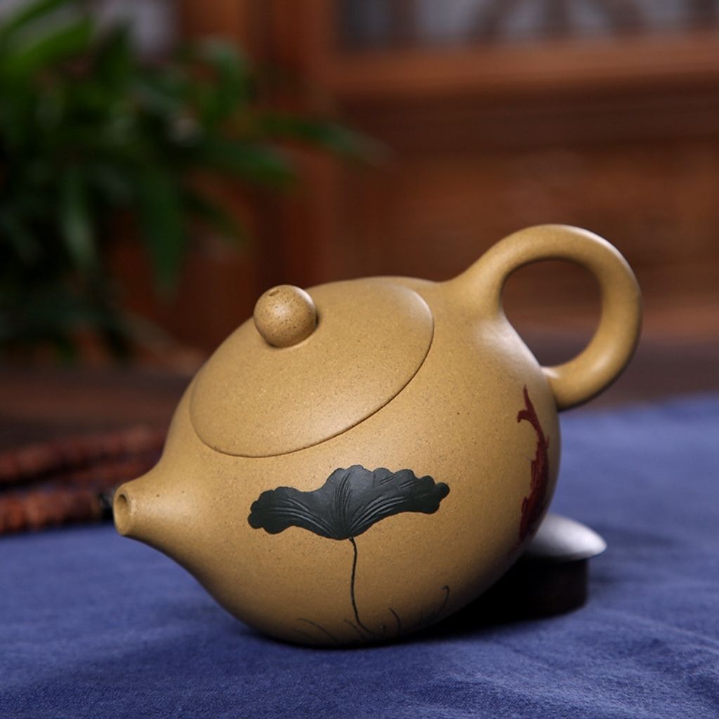 Interior view of purple sand clay teapot showing natural unglazed brewing chamber
