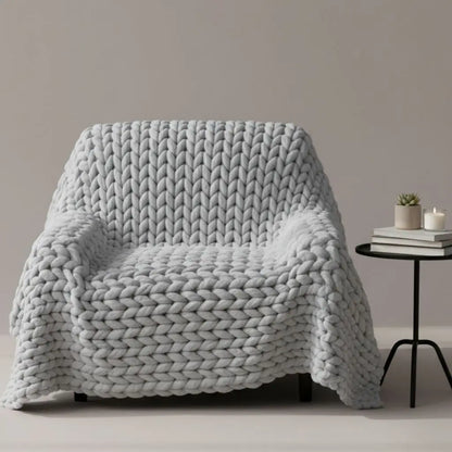  Double sided chunky knit throw displaying thick woven pattern and soft acrylic fabric texture