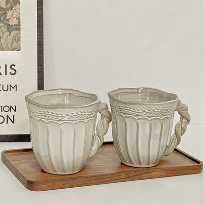 Ceramic coffee cup with vintage charm, handmade design perfect for serving hot beverages at home