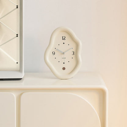 Wooden table clock profile showing curved sleek silhouette with modern craftsmanship and elegant form