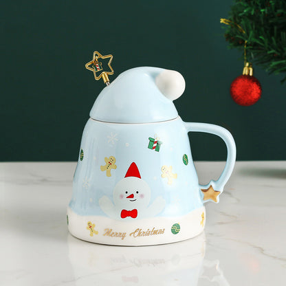 Close view of holiday themed ceramic mug showing detailed festive artwork and smooth glaze