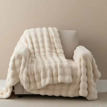 Soft bubble textured flannel throw blanket in polyester for year round comfort