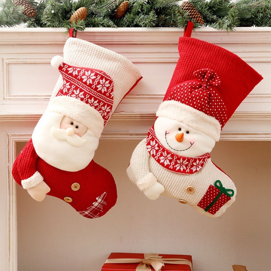 Knitted christmas stocking with structured form and decorative top edge