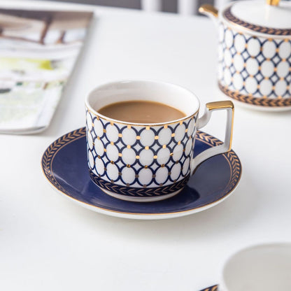 Porcelain tea and coffee set in bone china with white ceramic cups and saucers